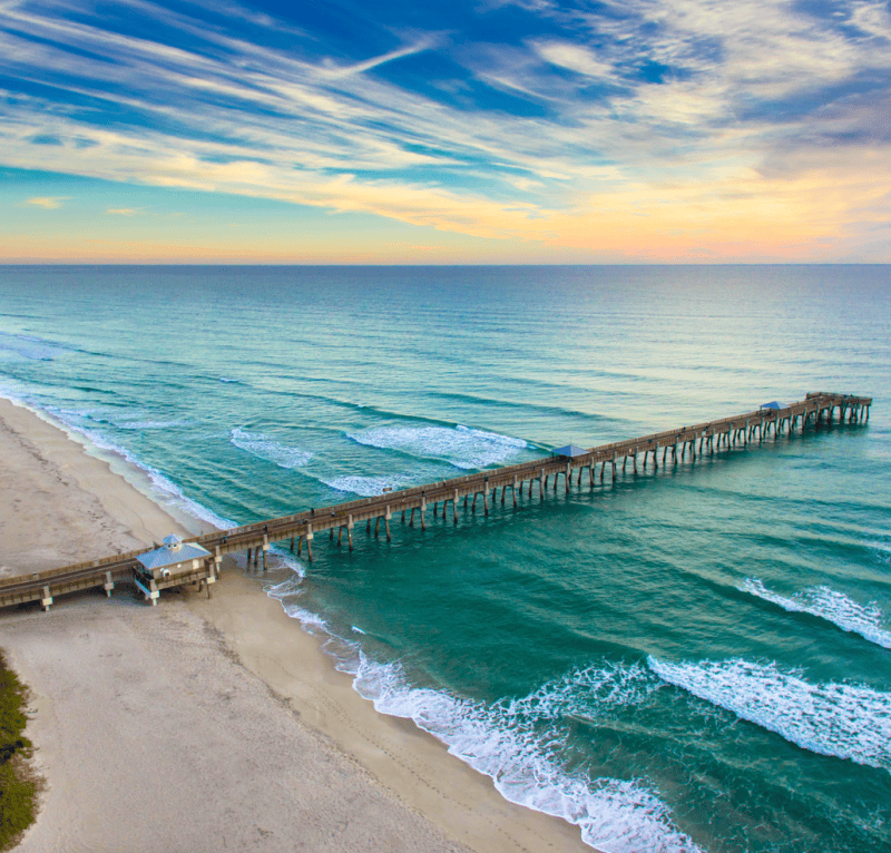 Sunset view of pier on ocean beach