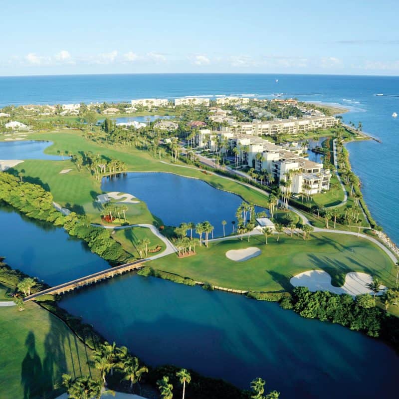 Aerial view of coastal golf course and ocean