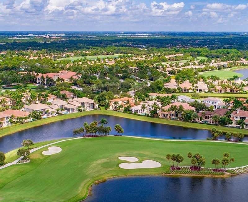 Aerial view of golf course and residential area.